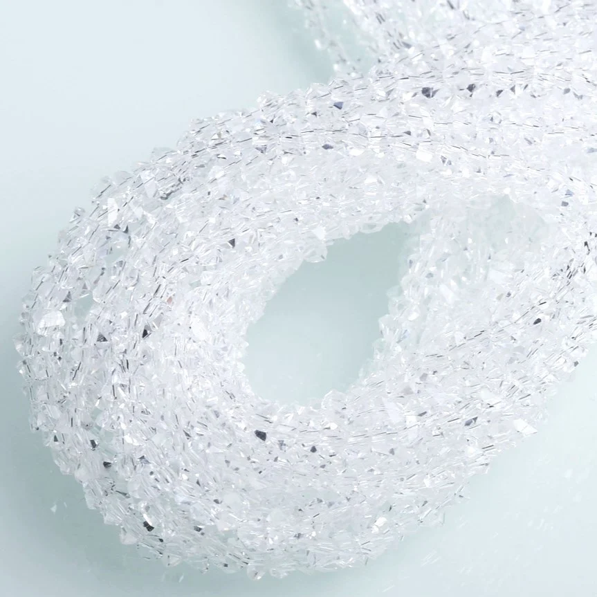 Намистини Swarovski огранювання трикутник 8 мм Ø 1 мм 40 см (+-85 шт.) Прозорий - Зображення 2